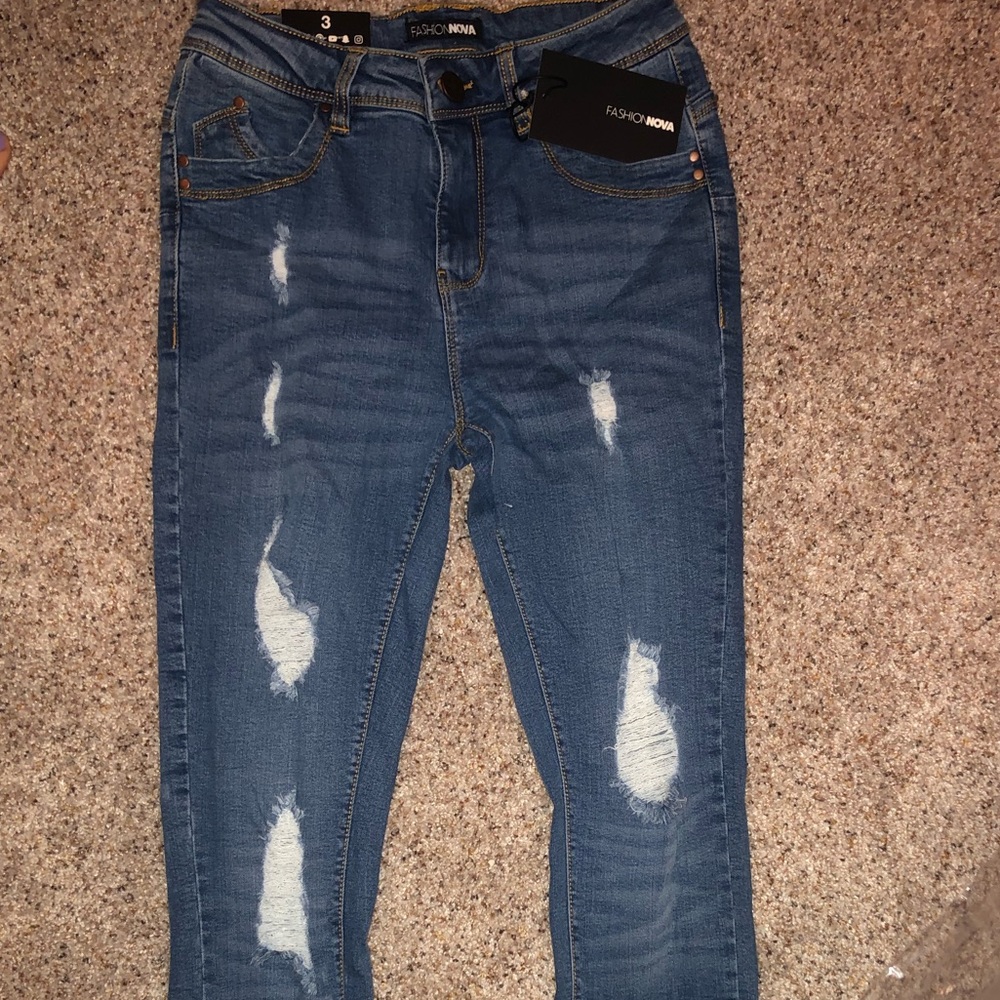 Ripped medium wash jeans